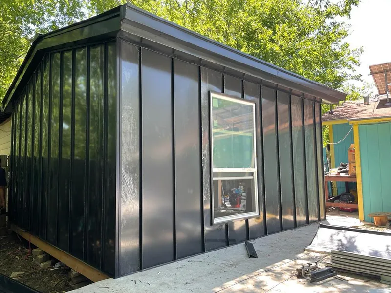 Black standing seam metal wall panels for Metal Roof Installation in North Branford