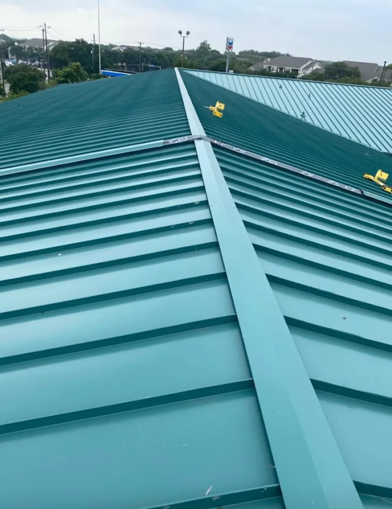 Green commercial metal roof ridge and valley for Metal Roof Repair in North Branford
