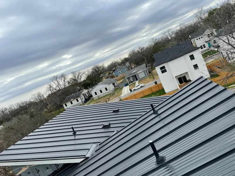 Standing seam metal roof panels with vents for Skylight Repair in North Branford